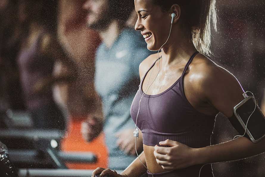 Girl Jogging in the fitness center at The Residences at The St. Regis Longboat Key